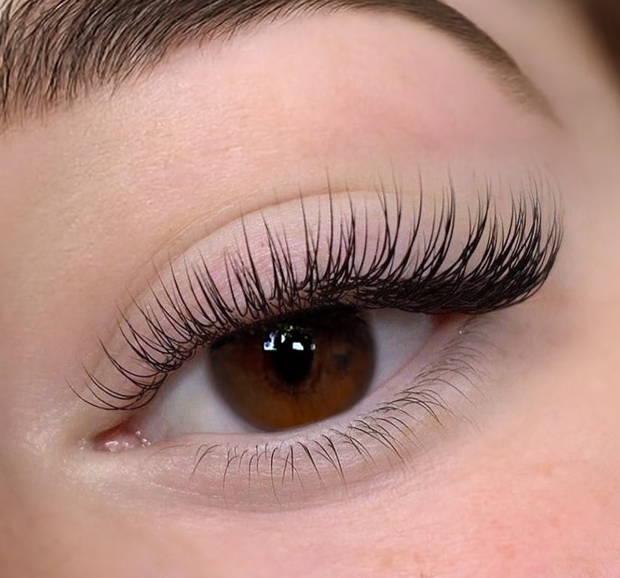 a closeup of an eye with angel styling