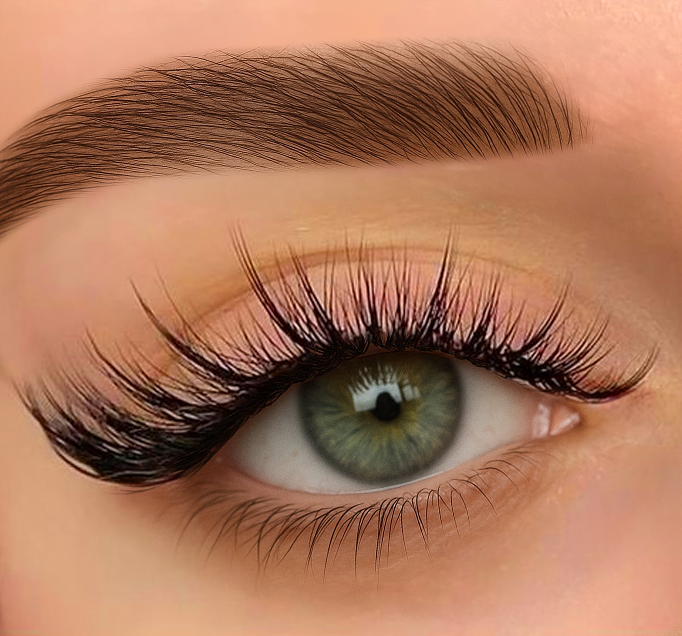an eye with lash extensions showcasing airy lash effect
