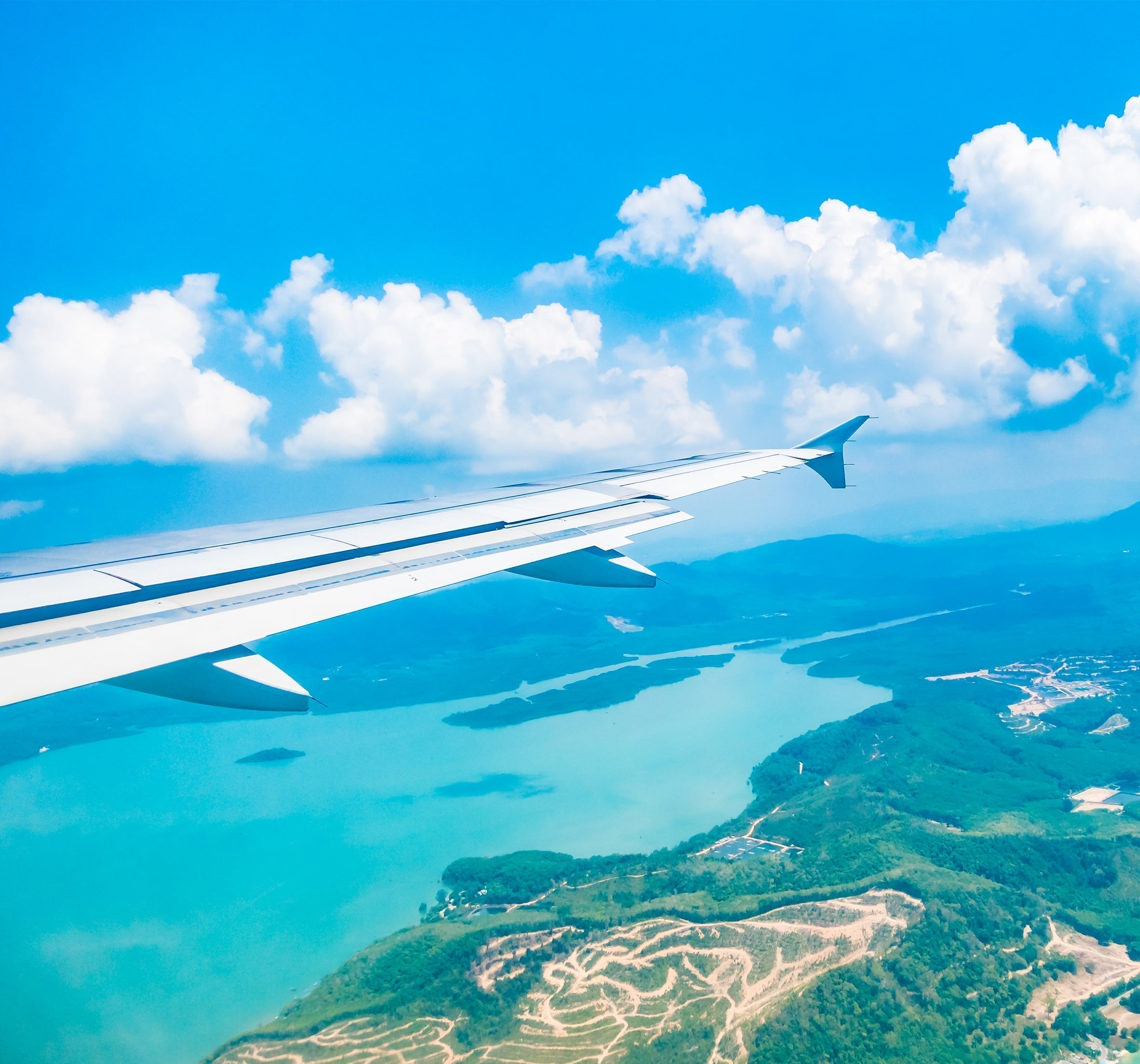 a plane and an island on the background