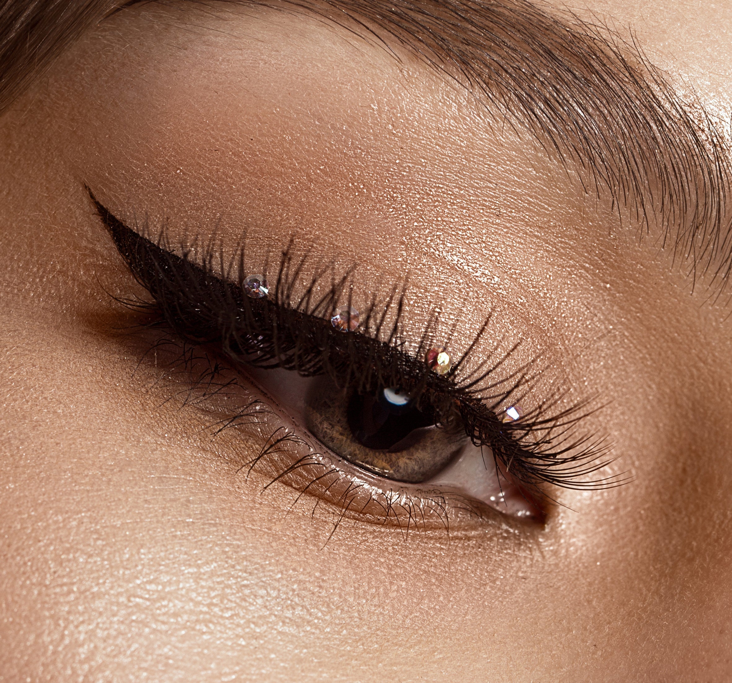 a closeup of an eye with lash extensions on