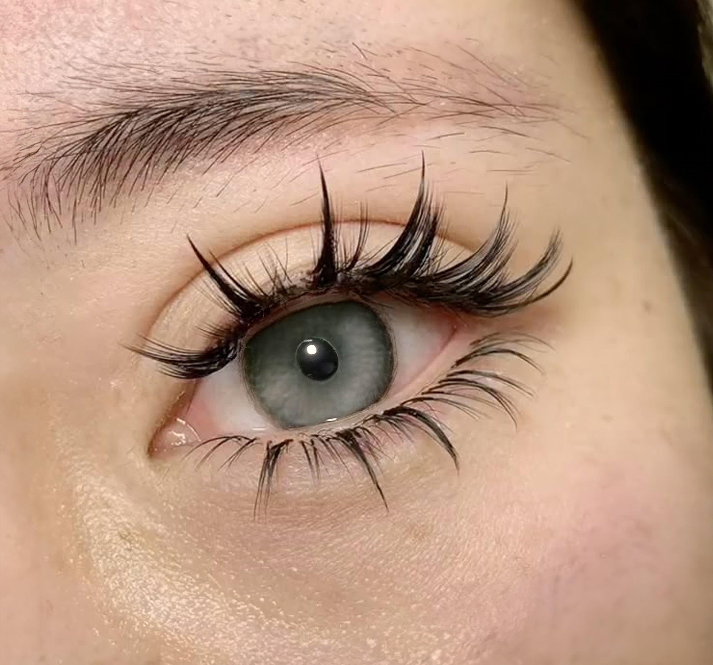a closeup of an eye with manga lash styling