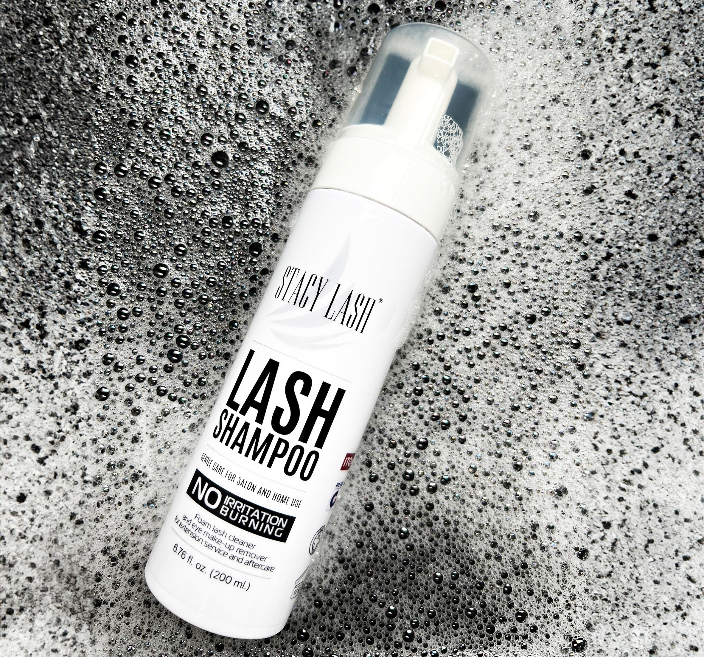 Lash Shampoo bottle covered in foam
