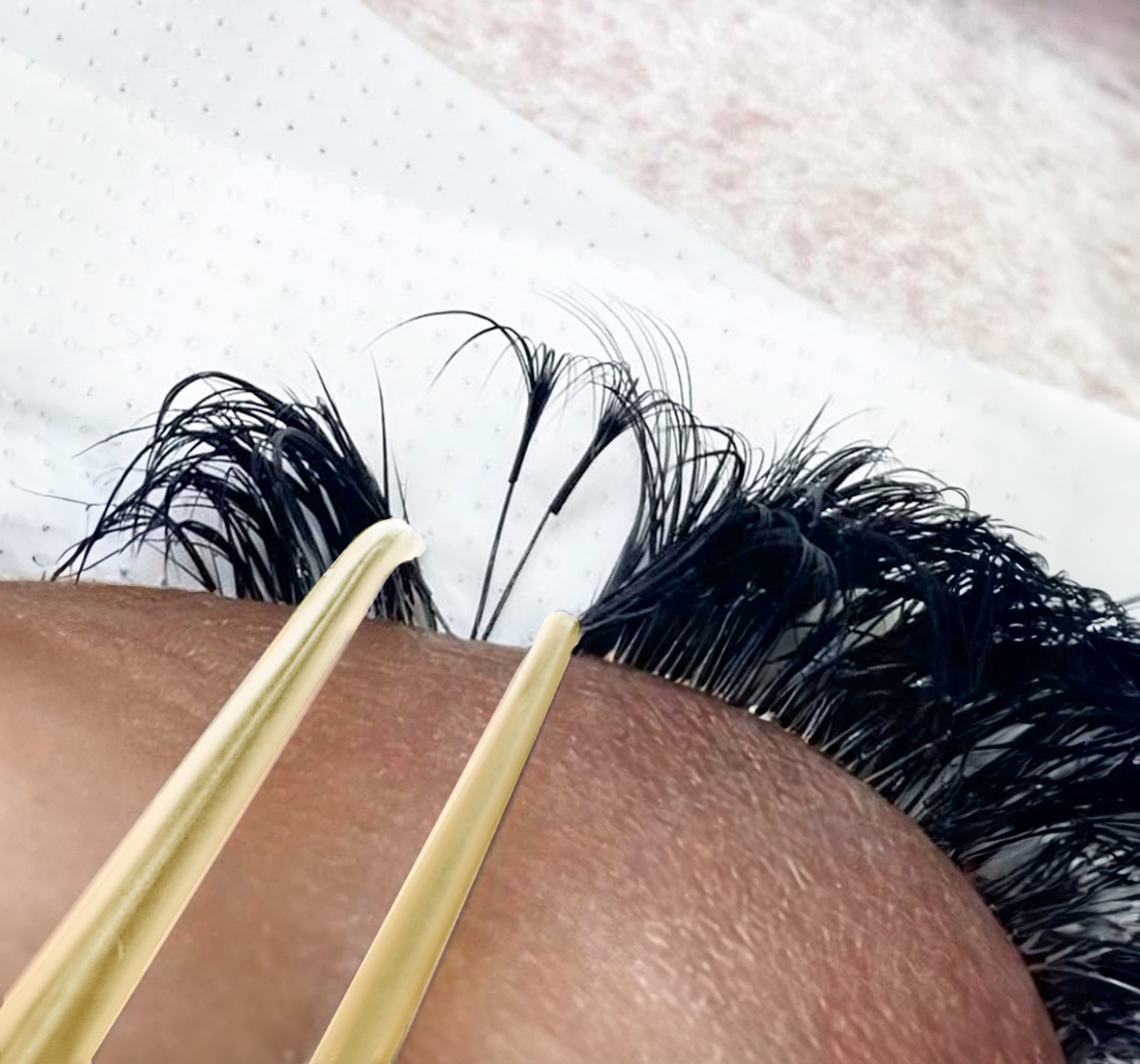 a closeup of the lash line with wrong extension placement
