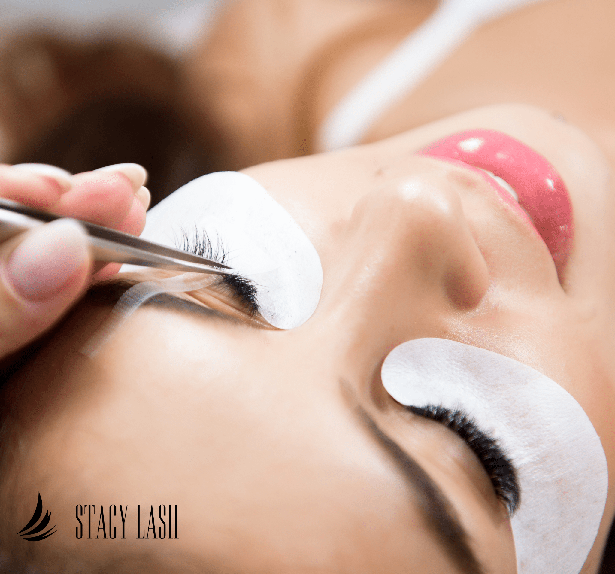 Professional lash artist applying eyelash extensions