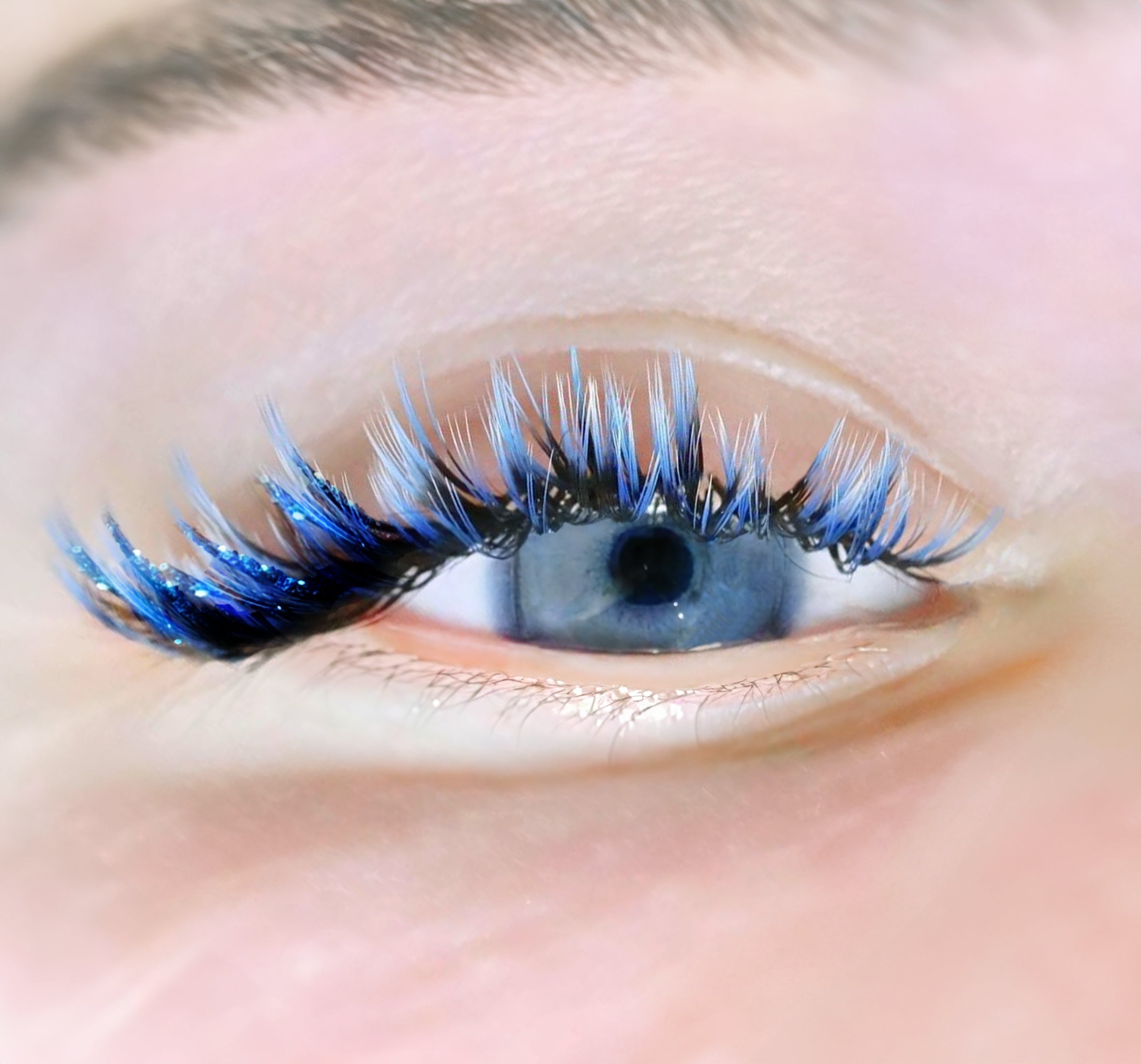 a woman with winter-themed lash extensions
